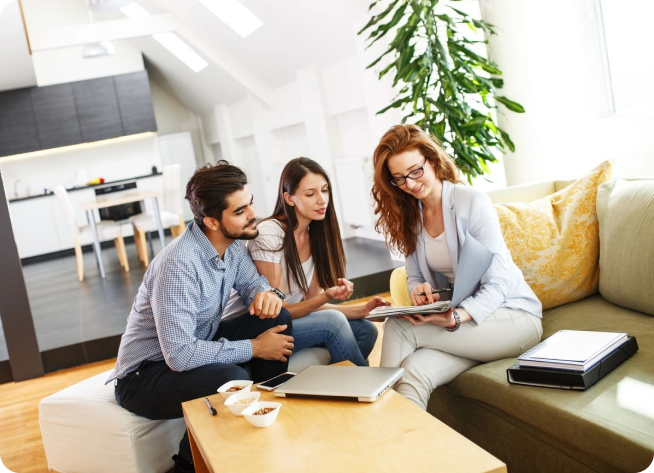 A group of people sitting on the floor